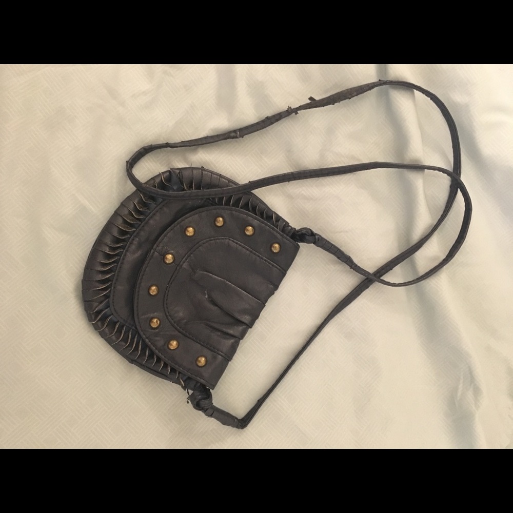 Well loved crossbody. Perfect for music fests.
